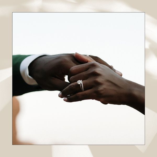 Close Up of Diamond Ring on Womans Hand