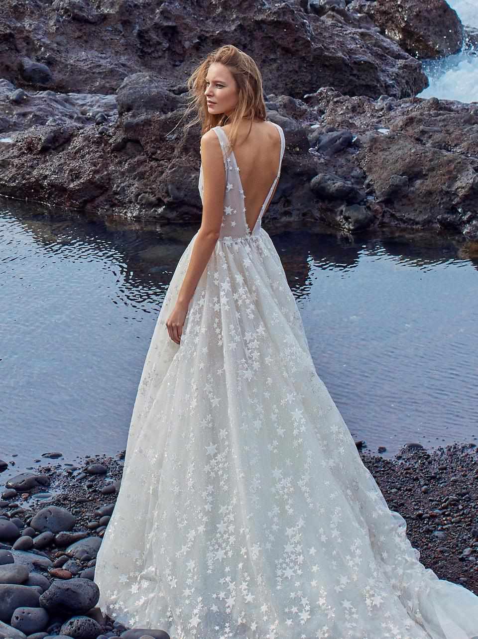 bride wearing a starry inspired wedding dress