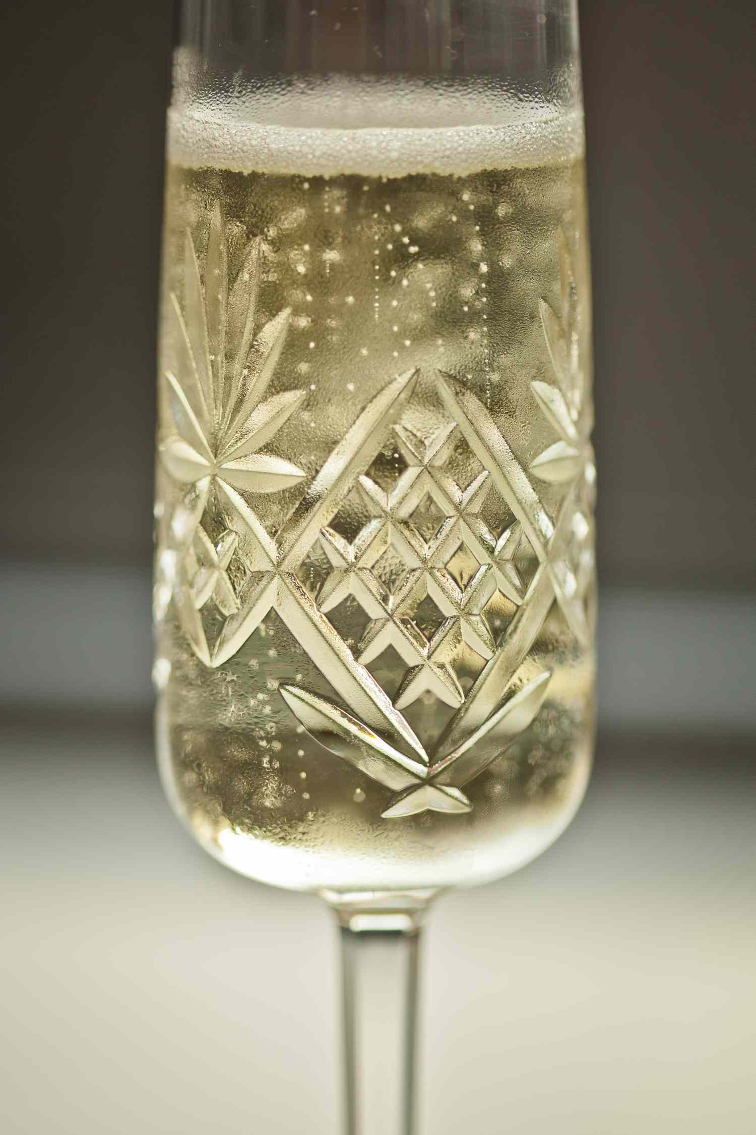 Close -p photo of crystal glassware with champagne 