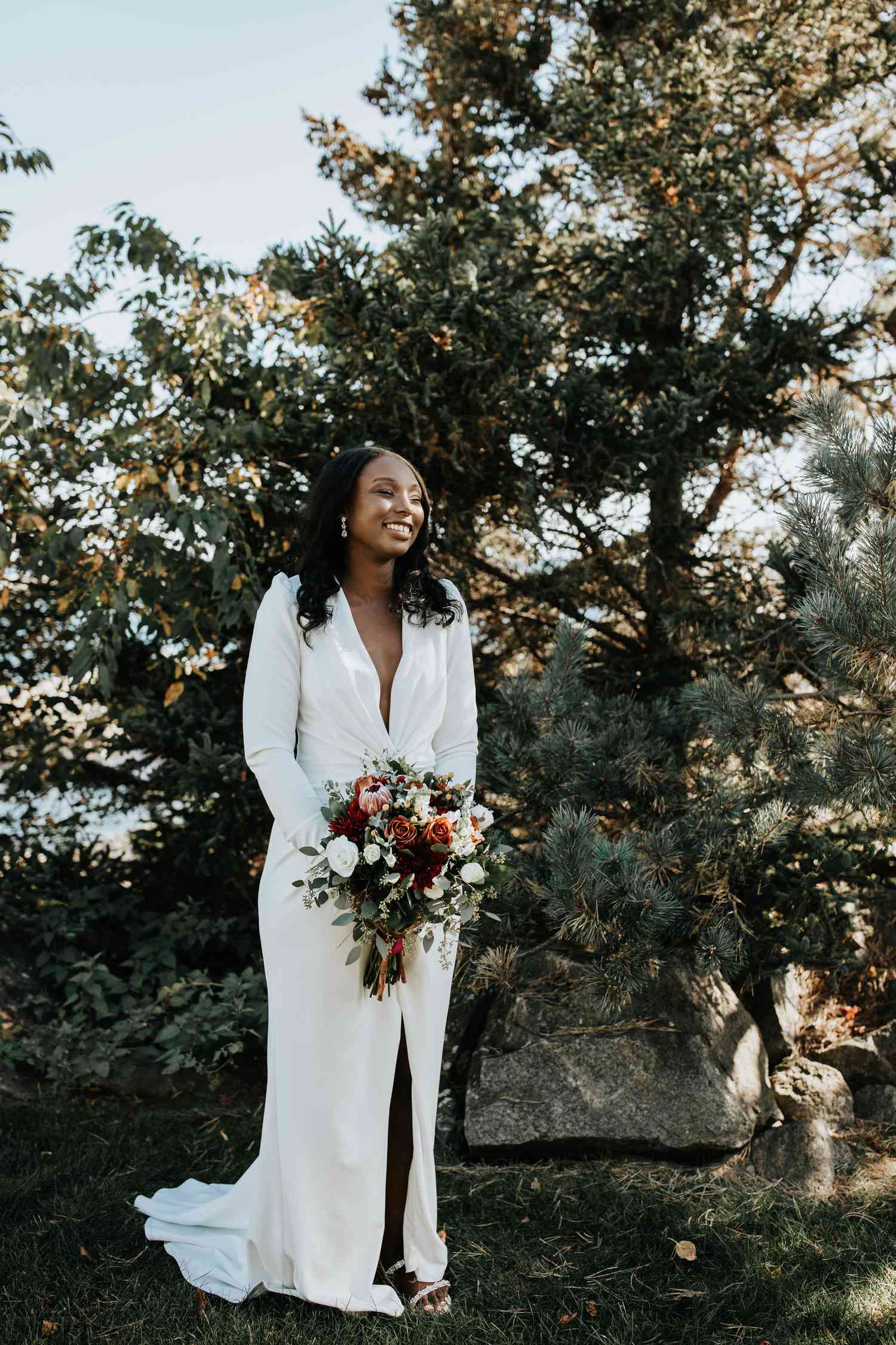 bridal portrait taken in front of pine trees