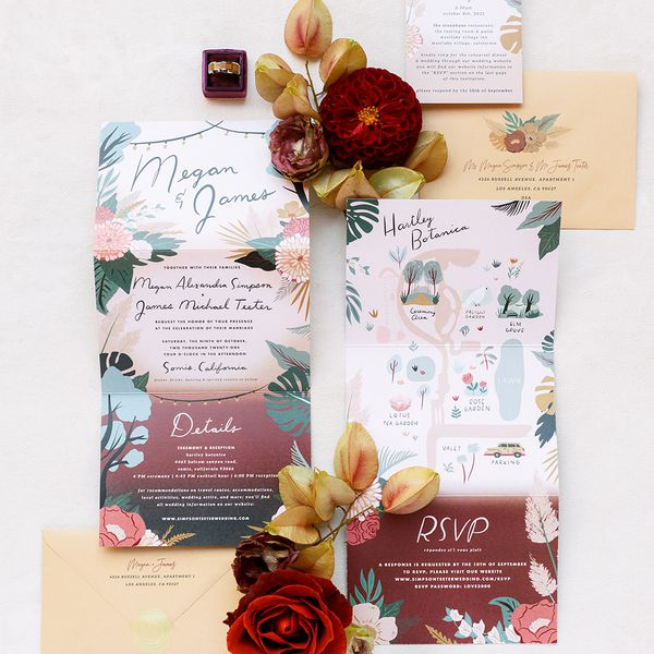 Colorful fall wedding invitation suite with save-the-date, invitation, and fresh flowers.