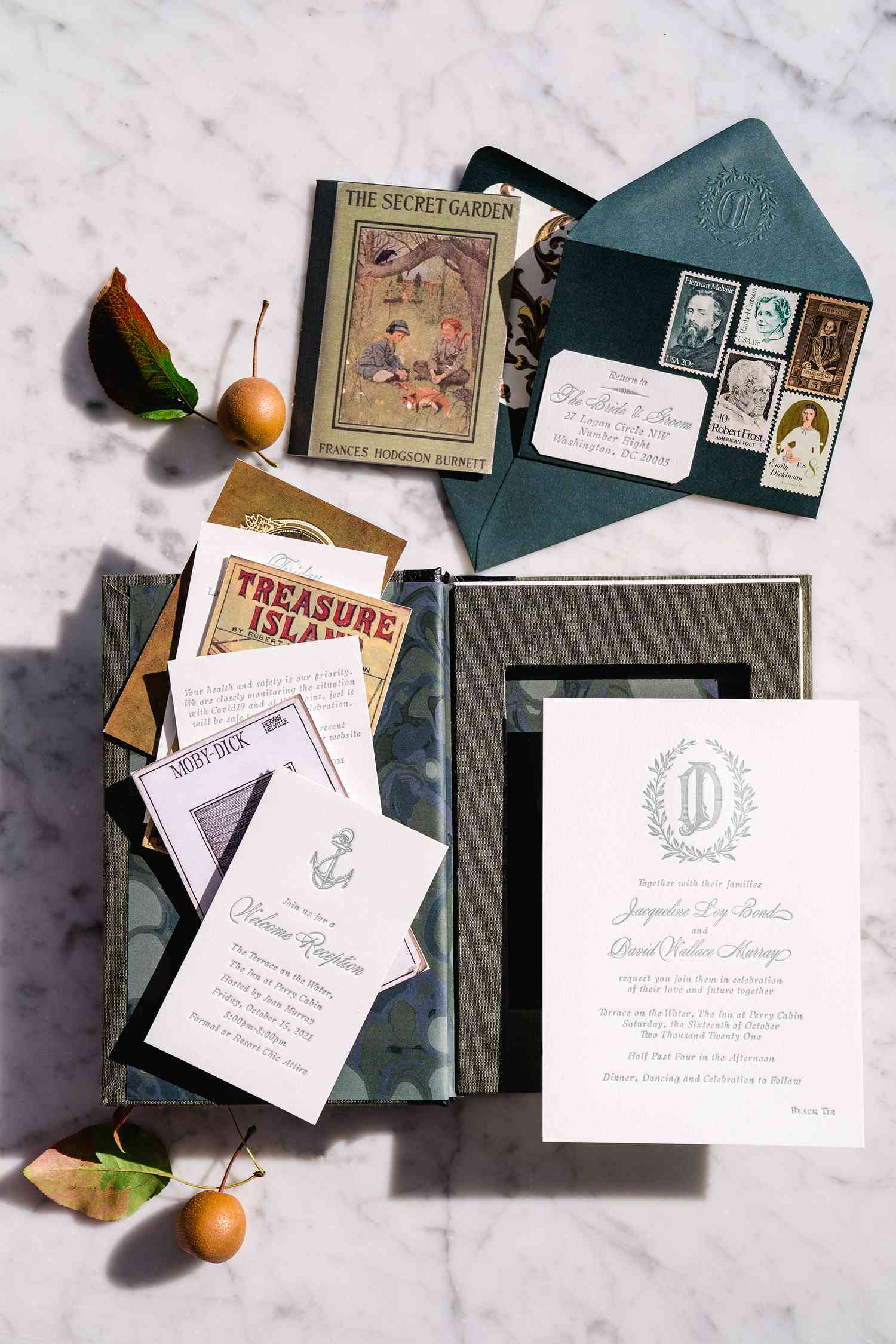 A vintage book themed boxed wedding invitation.