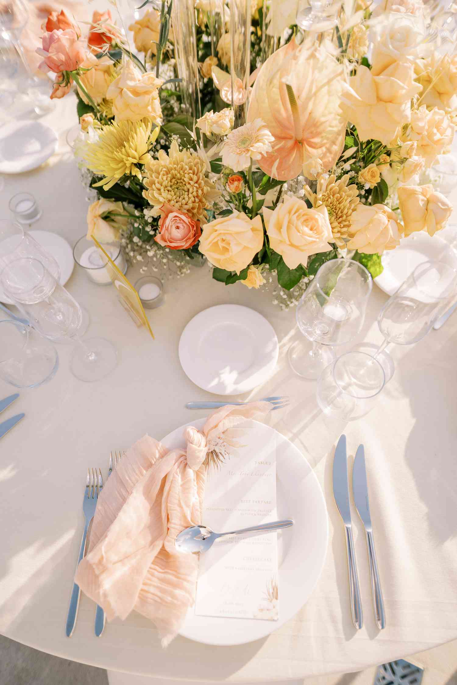 place settings with pops of orange