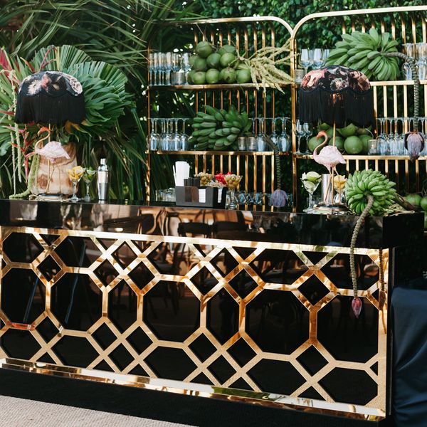 black and gold bar with art deco lattice detail