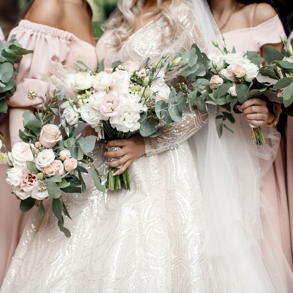 Close-up of wedding bouquets that bride and bridesmaids are holding