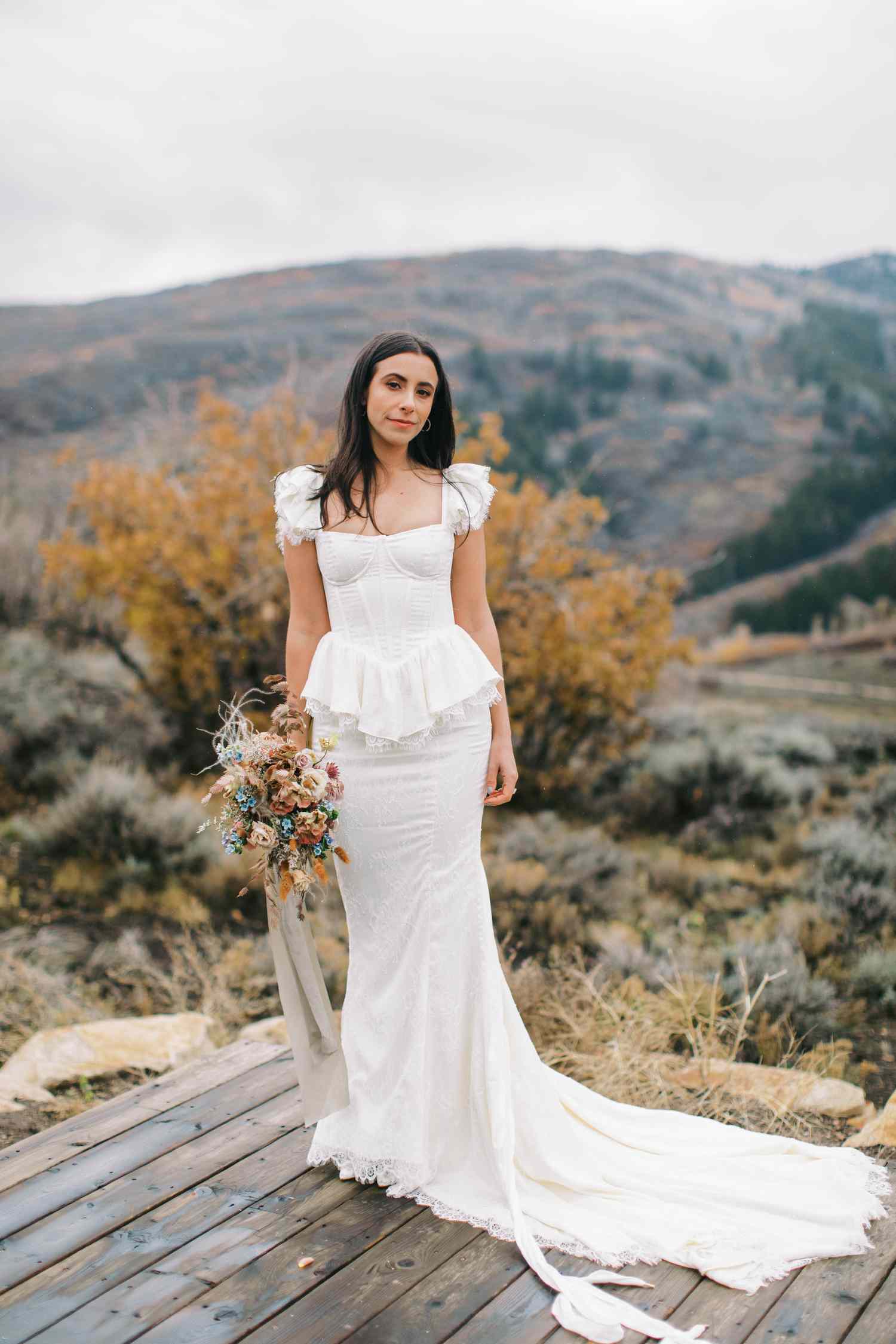 Bridal portrait taken in front of a mountainous backdrop