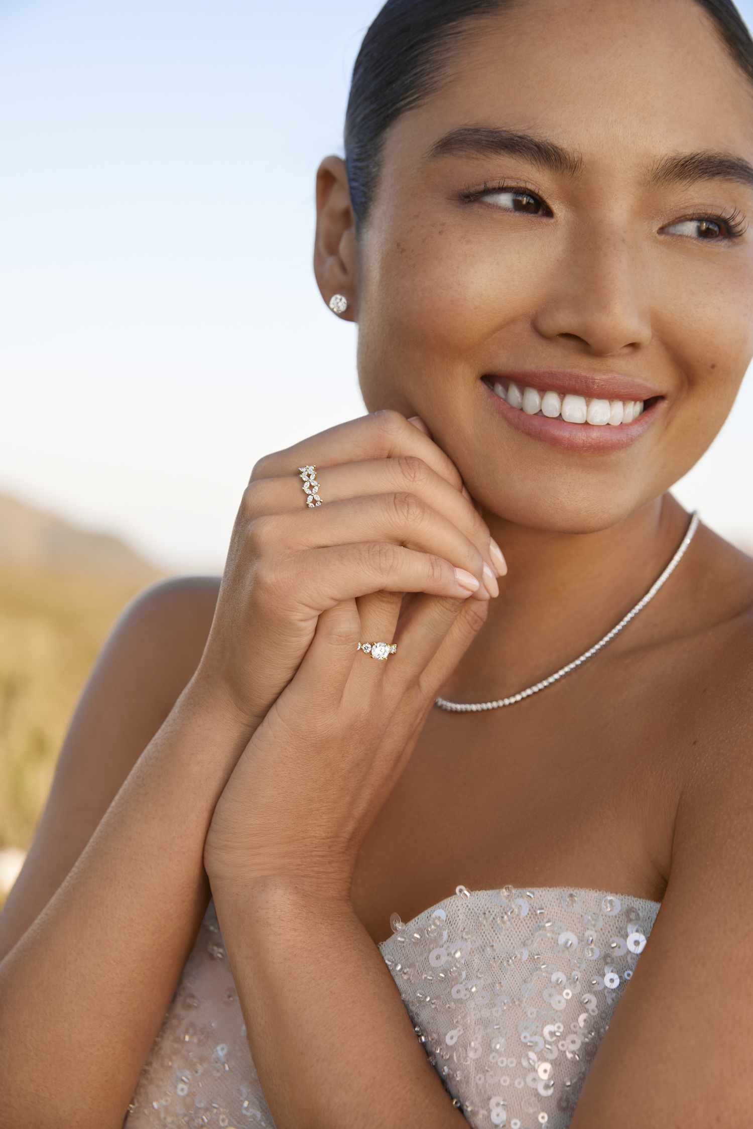 bride wearing Brilliant Earth engagement ring