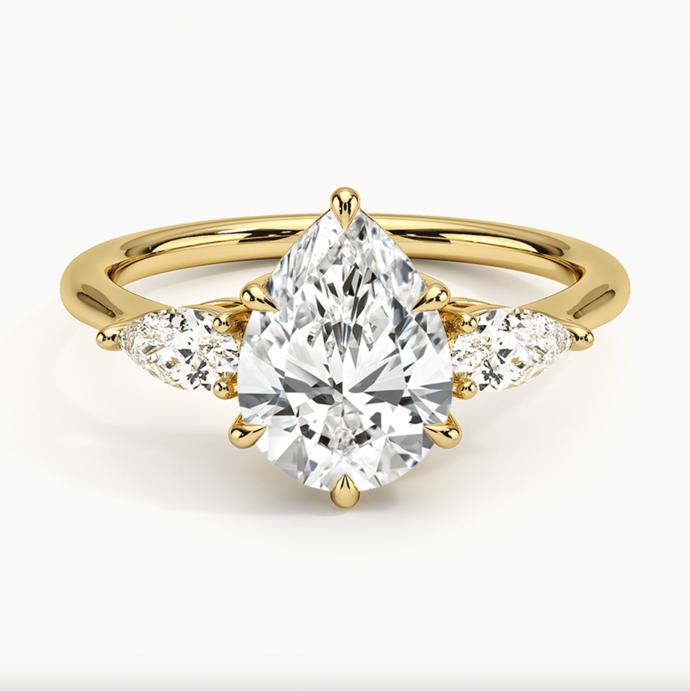 Three-Stone Pear-Shaped Diamond Engagement Ring on Yellow Gold Band