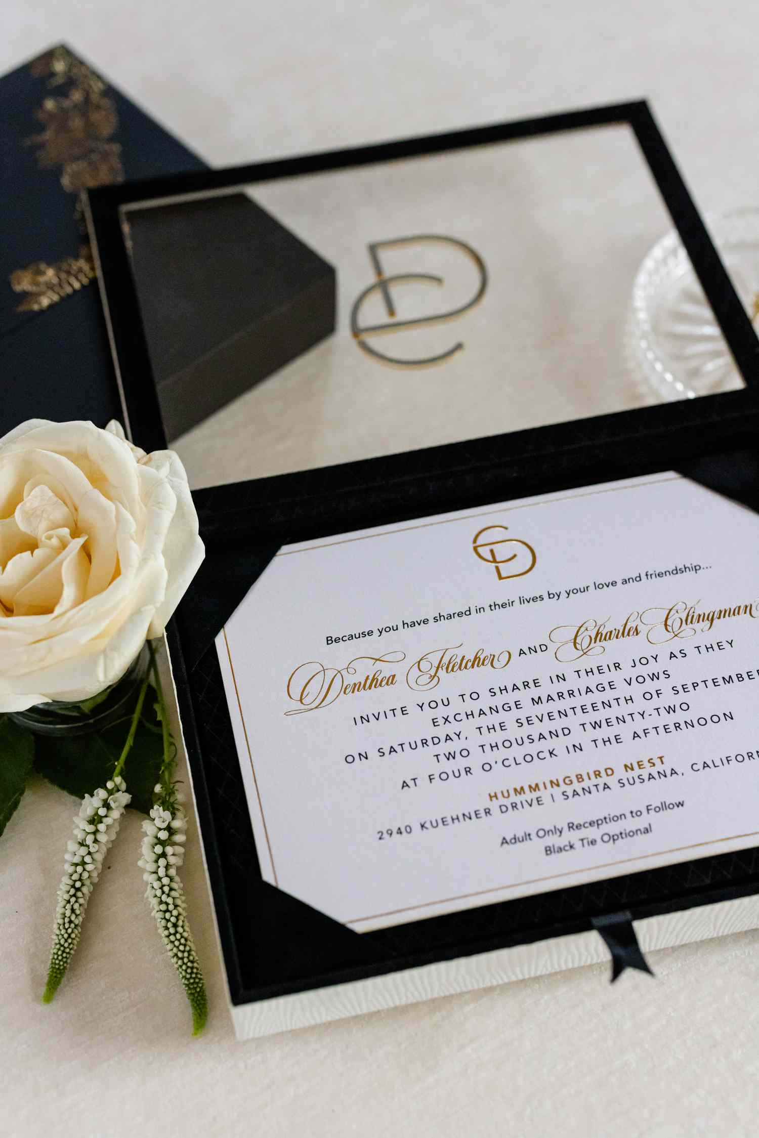 An elegant boxed wedding invitation.