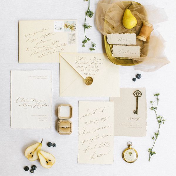 flat lay image of a wedding invitation suite