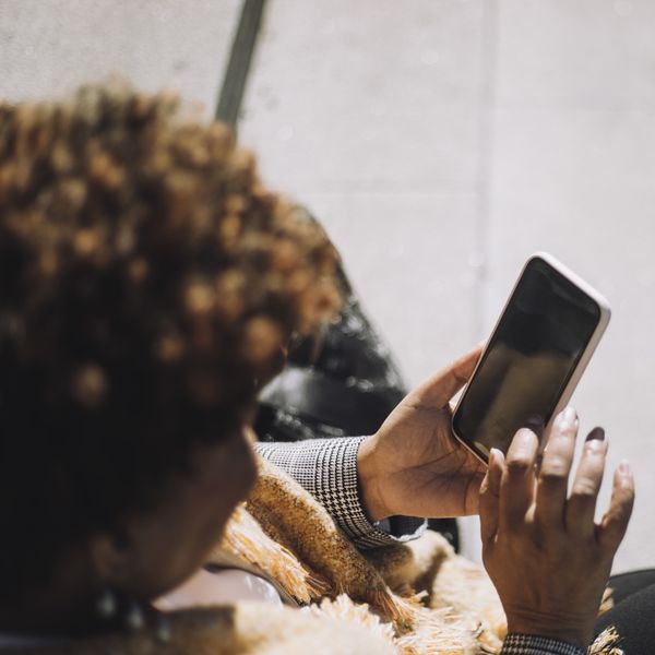 woman texting on her phone