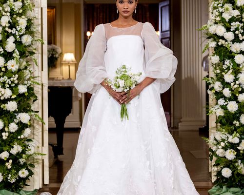  Nardos BFW Collection model wearing white wedding dress with puffed sleeves