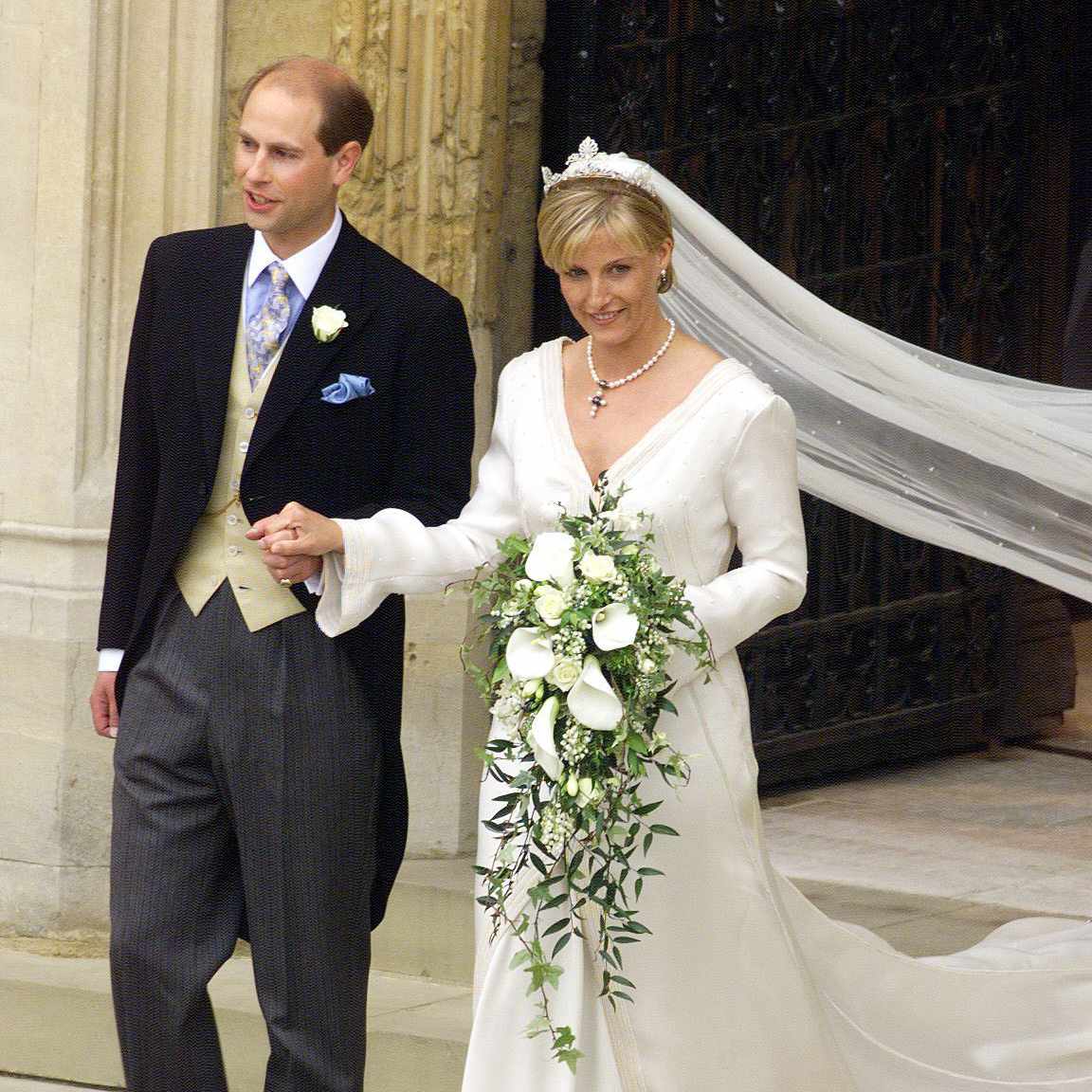Prince Edward and Sophie Wessex Holding Hands and Walking Out of Church in Wedding Attire