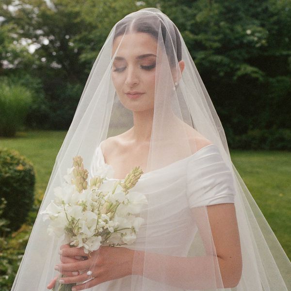 bridal portrait of a bride wearing a veil covering her face