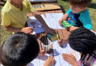 Post Avenue students coloring on one of their themed days.