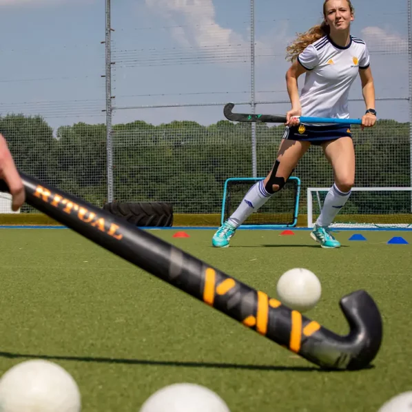 Girls playing hockey