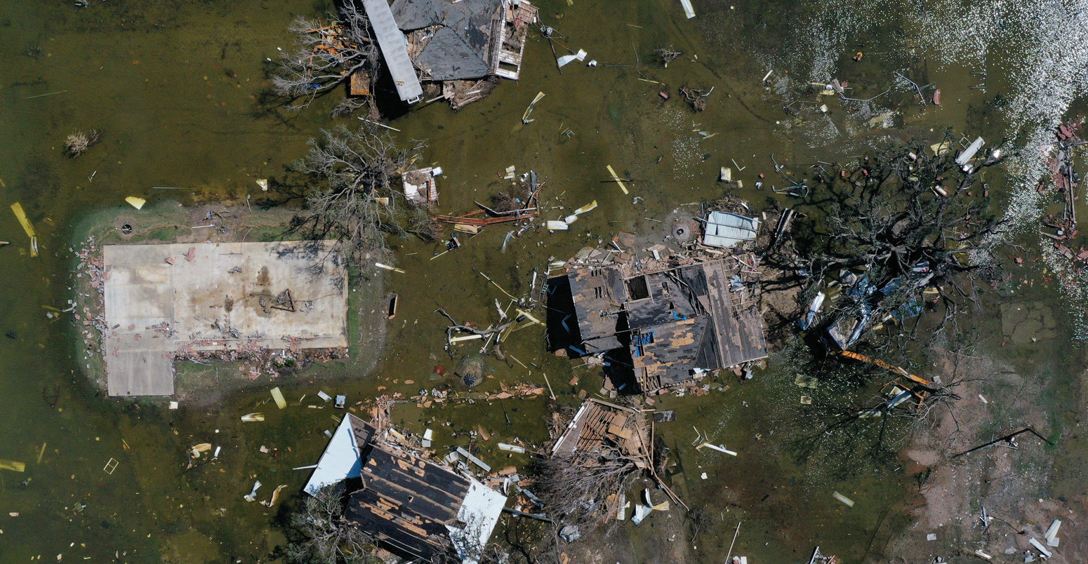 Homes and businesses destroyed by Hurricane Laura are surrounded by flood waters in the aftermath of Hurricane Delta in Louisiana, USA, 2020