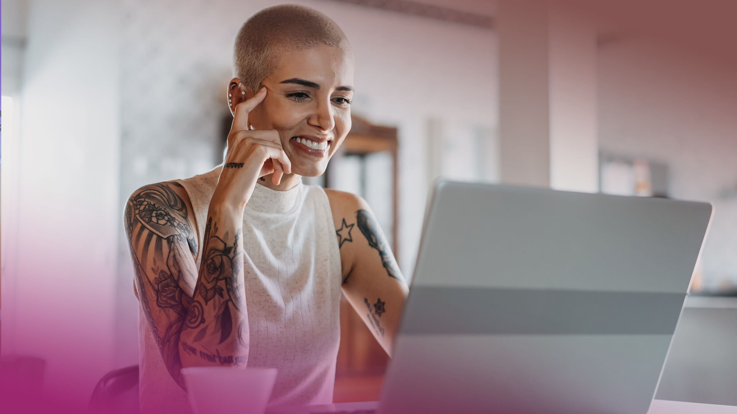 Portrait of woman using laptop at home