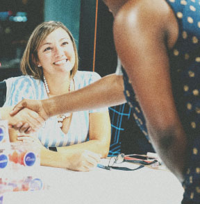 women shaking hand