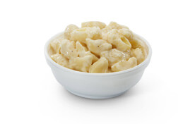 A bowl of macaroni and cheese.