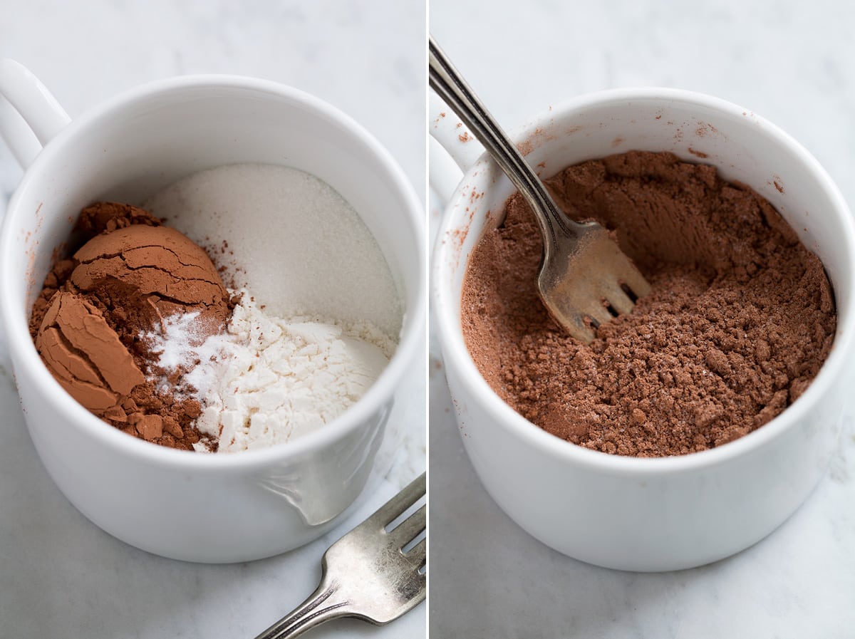 First step of making mug cake shown, whisking dry ingredients in mug. 