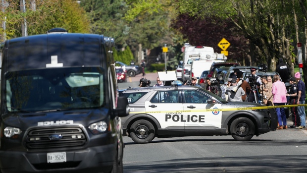 Media wait for a press conference as Toronto Police investigate a crime scene outside the mansion of Canadian rap mogul Drake in Toronto's Bridle Path neighbourhood, Tuesday, May 7, 2024. 

Paramedics said a security guard working outside the home was taken to hospital with serious but non-life-threatening injuries in an overnight shooting. 

(THE CANADIAN PRESS/Nathan Denette)
