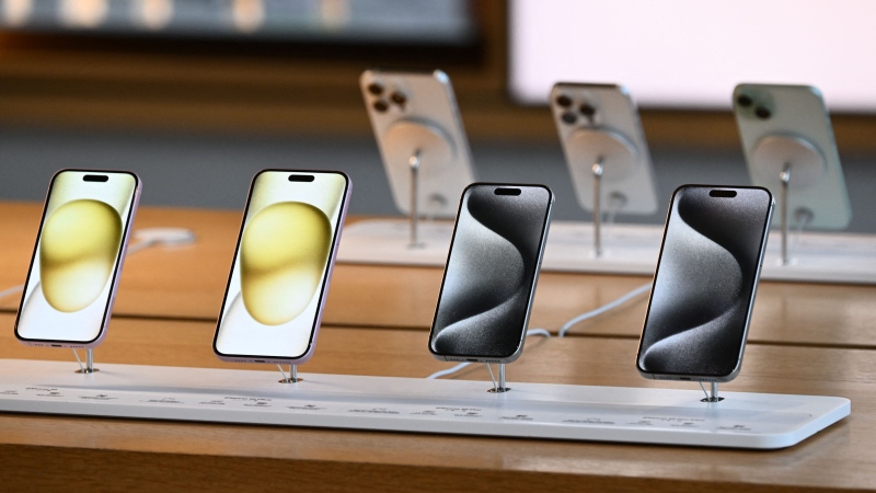 Apple iPhone 15 phones are displayed for sale at The Grove Apple store on launch day in Los Angeles, Calif., on Sept. 22, 2023.
