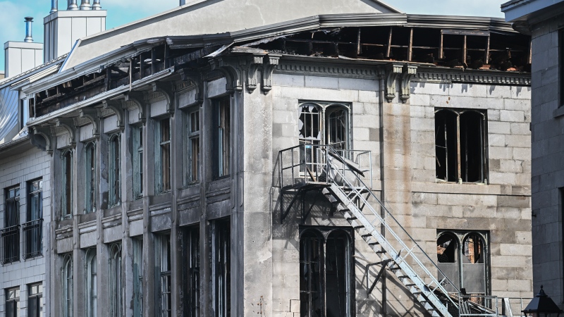 A building is shown following a fatal fire in Old Montreal on Saturday, Oct., 5, 2024, which left two people dead. THE CANADIAN PRESS/Graham Hughes