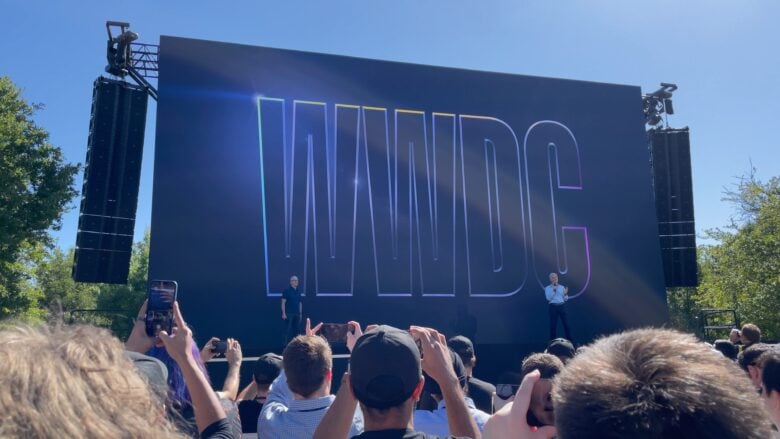 Tim Cook and Craig Federighi take the stage to greet attendees before the prerecorded Keynote plays.