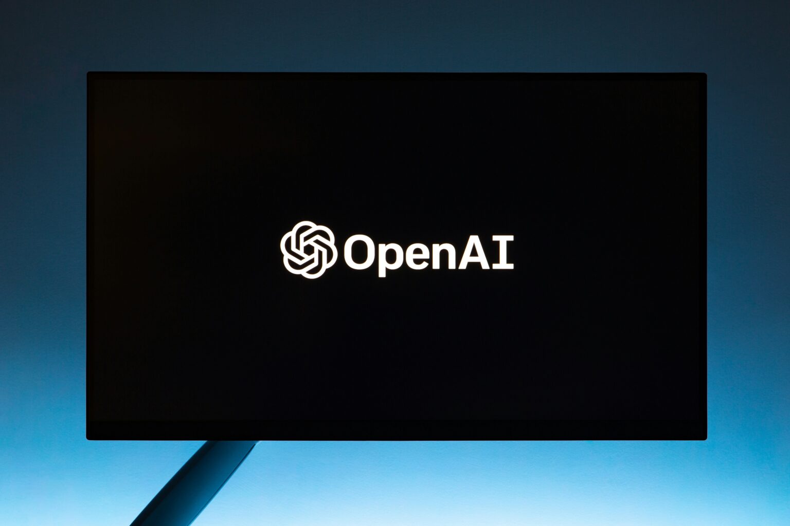 OpenAI logo on a screen