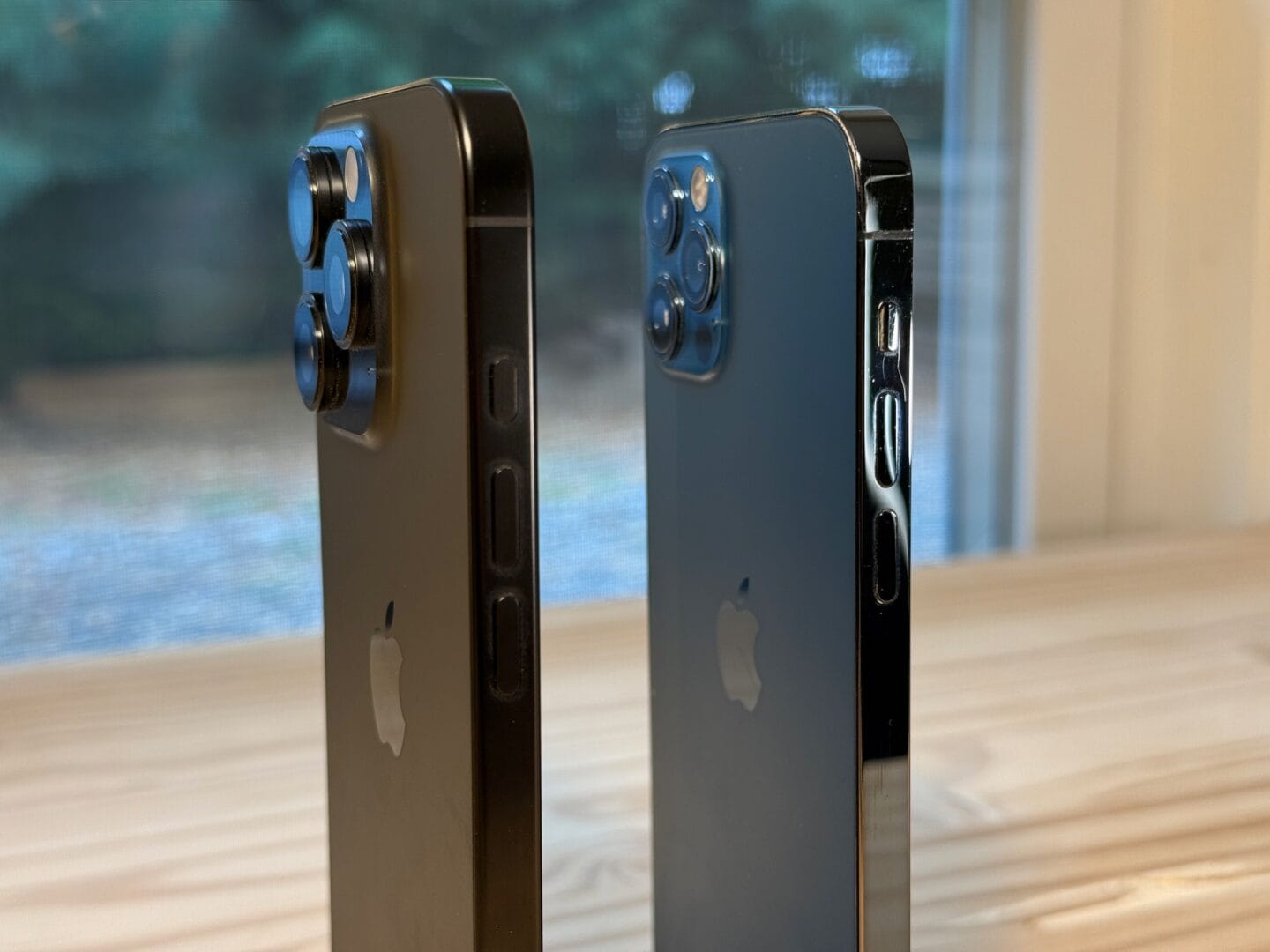 iPhone 12 Pro and 16 Pro standing vertically next to each other