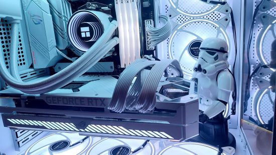 Gaming PC with a white paint and lighting scheme includes a white stormtrooper GPU holder