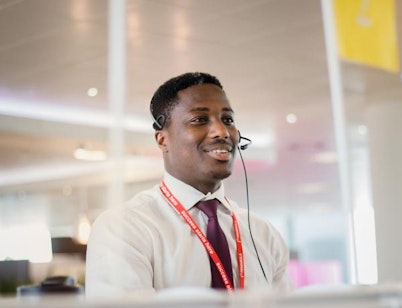 Employee providing HR advice to a client over the phone