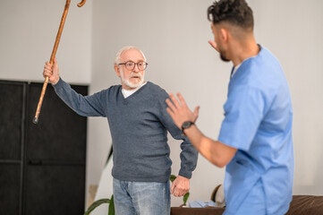 A patient being aggressive to their carer