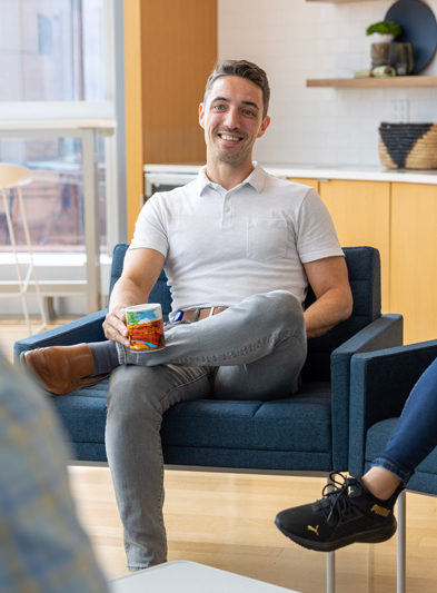 A smiling employee in a meeting