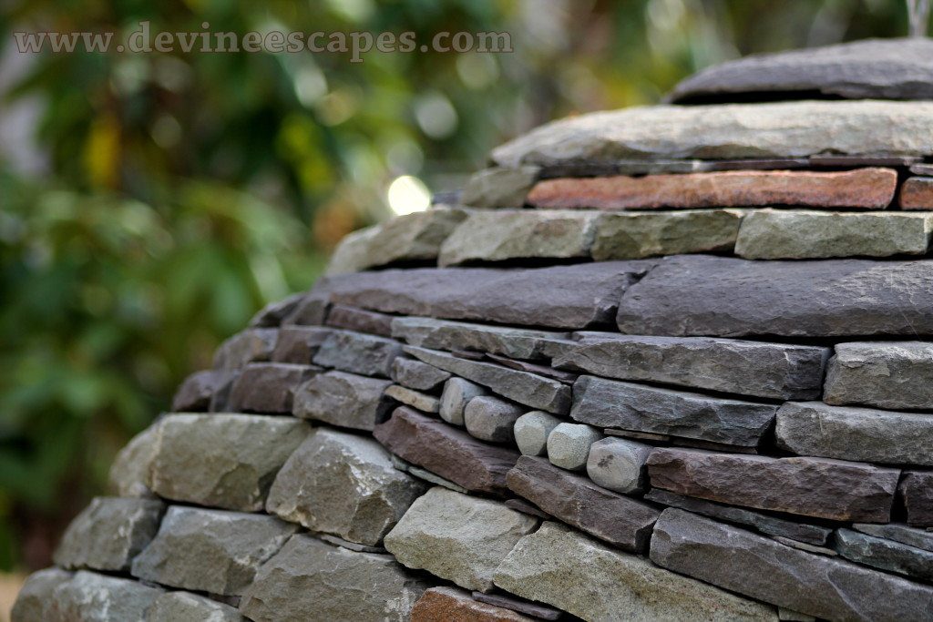 visionary dry stone sphere garden sculpture