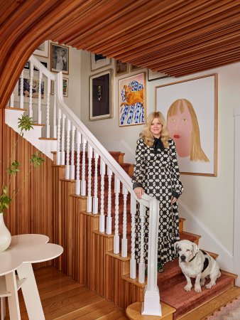 woman on stairs with dog