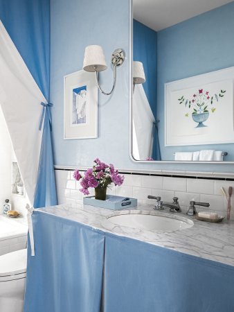 Blue bathroom with skirted sink