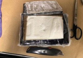 A courier was caught leaving the defendant's Antioch home with six kilograms of cocaine and more than $100,000 in cash. 