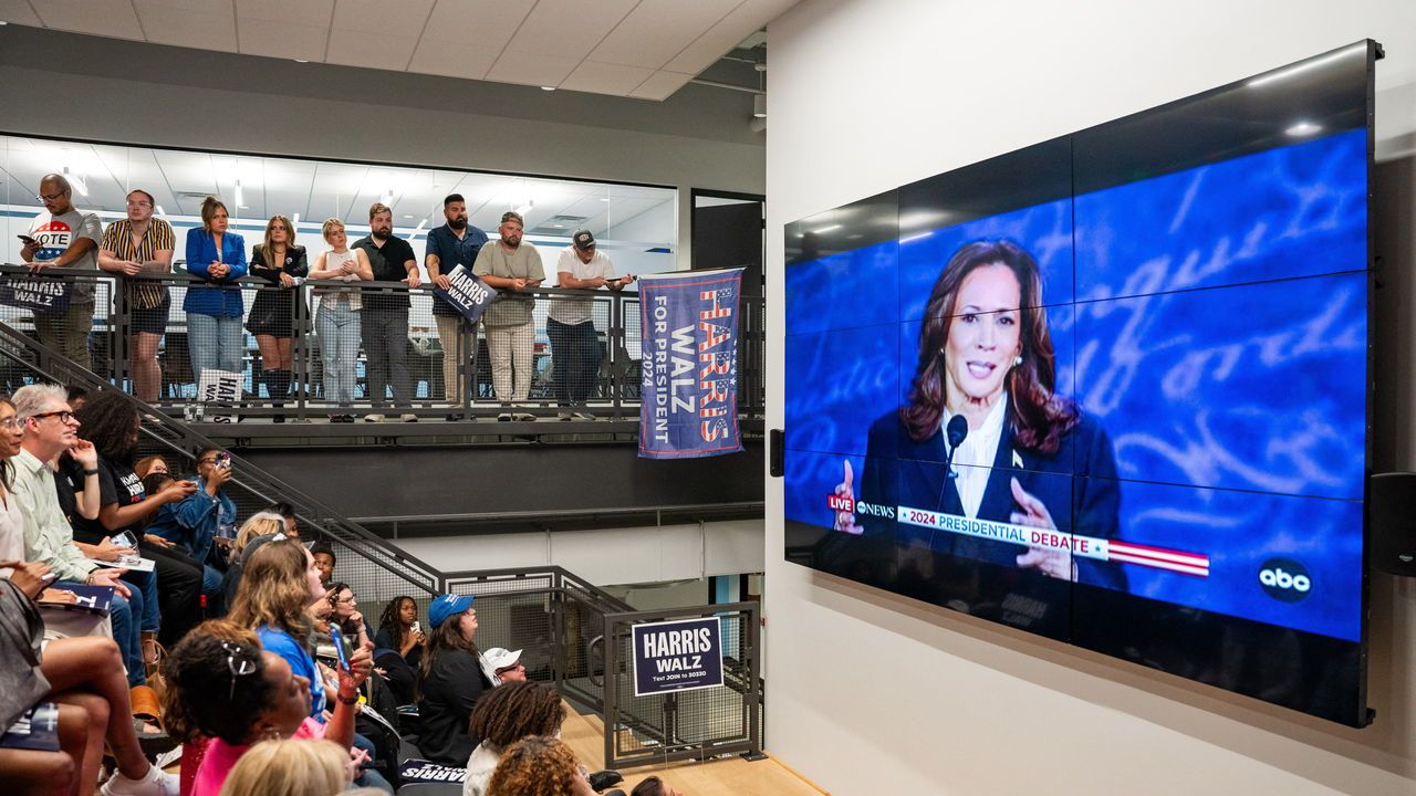 Supporters of Vice President and Democratic presidential candidate Kamala Harris attend a watch party during the US Presidential debate.