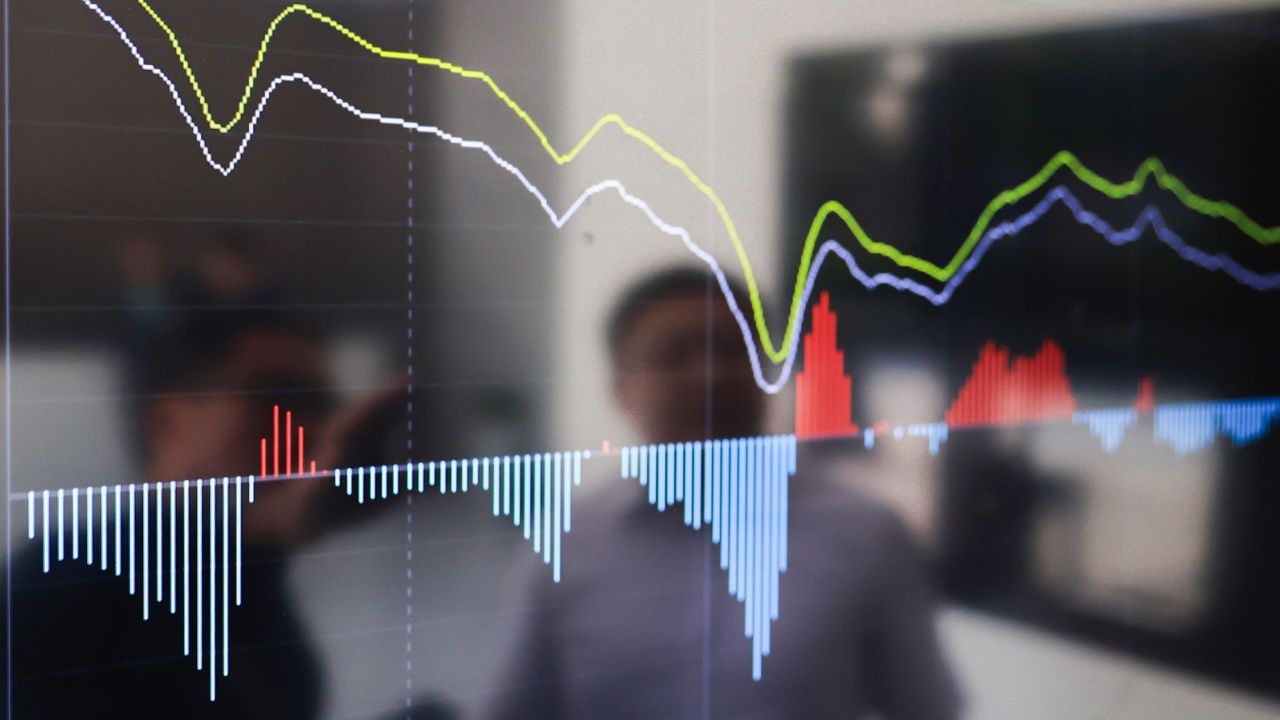 An investor looks at stock market data n Nanjing, China