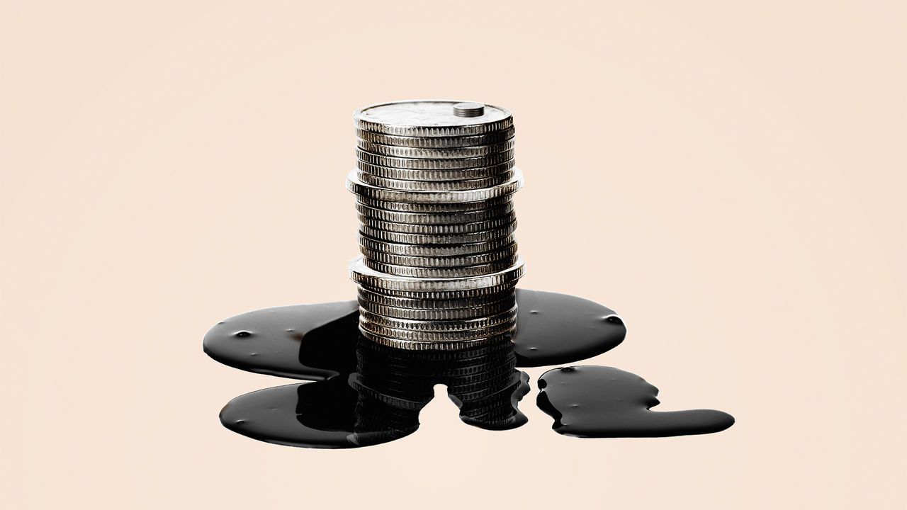 A Stack of coins on an oil puddle. 