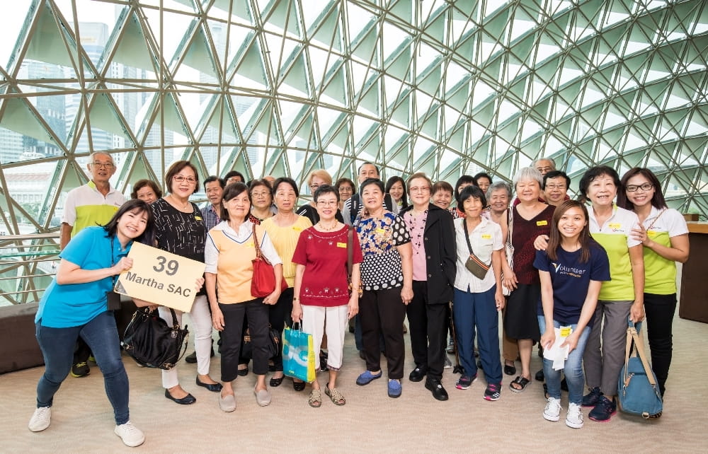 Beneficiaries after watching a concert at Esplanade.