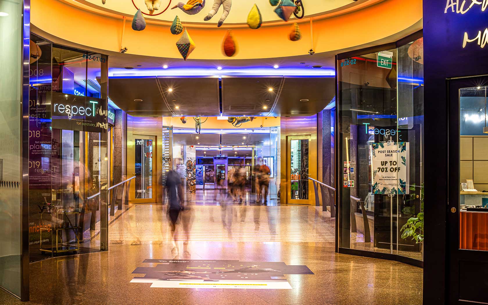 Image of the Theatre Street that connects Esplanade Mall with Esplanade Concourse that is lined with shops. 