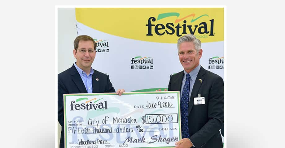 Mark Skogen presenting a check to the City of Menasha