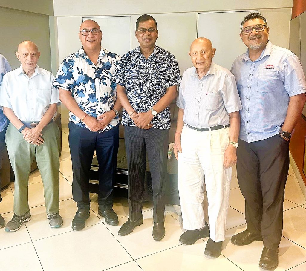 INSET: L-R: Punjas Group of Companies senior director Jagjiwan Punja, Group Managing Director Rajesh Punja, DPM and Finance Minister Prof Biman Prasad, senior director Kanti Punja and director Pravish Punja pictured during the tour of the new facility in Lautoka. Picture: SUPPLIED