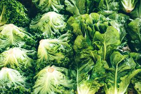 Bunches of lettuce at a market.