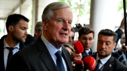 Le Premier ministre, Michel Barnier, lors d'un déplacement à Reims (Marne), le 11 septembre 2024. (FRANCOIS NASCIMBENI / AFP)