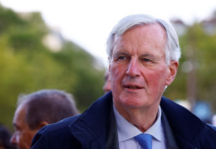 Le Premier ministre Michel Barnier, lors de la parade des athlètes olympiques et paralympiques à Paris, le 14 septembre 2024. (SARAH MEYSSONNIER / AFP)