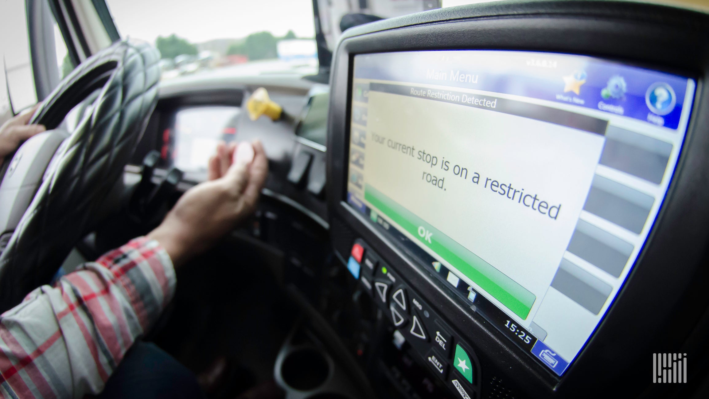 An ELD seen inside a truck illustrating an article about Canada's ELD mandate.